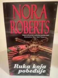 RUKA KOJA POBEDJUJE